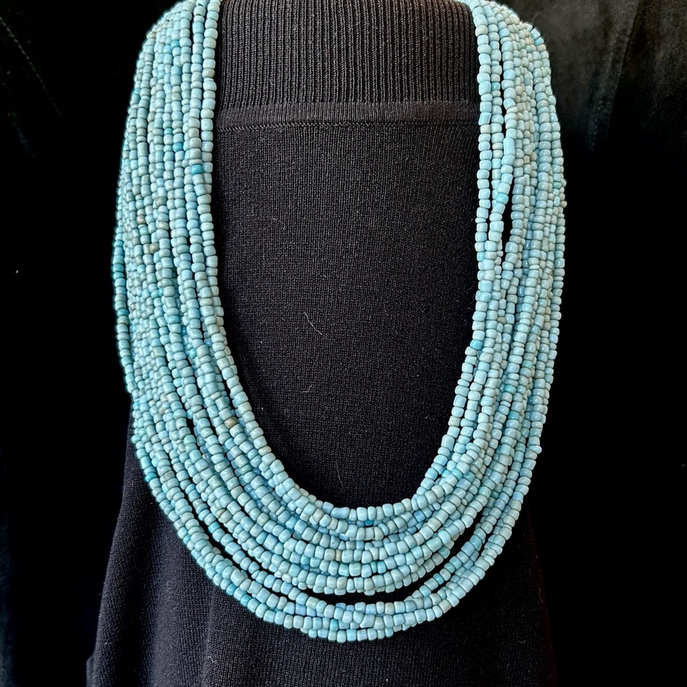 Turquoise necklace. Multi-strand turquoise-like color elastic beaded nec…